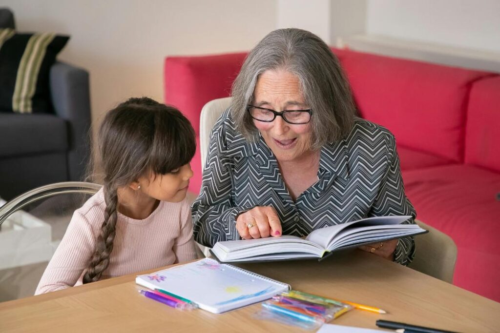 resident reading to young child