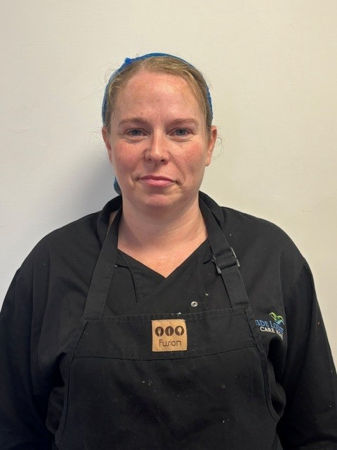 care home chef in black polo shirt