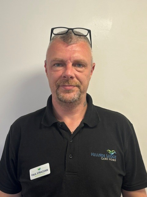 man in black polo shirt